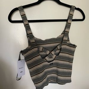 Woven RVCA tank. Never been worn, still has tag.
